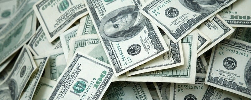 tas de billets dollars américains